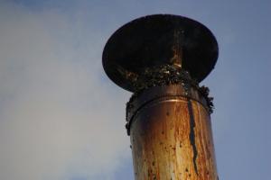 What threatens condensate in the chimney of a gas boiler and how it is eliminated